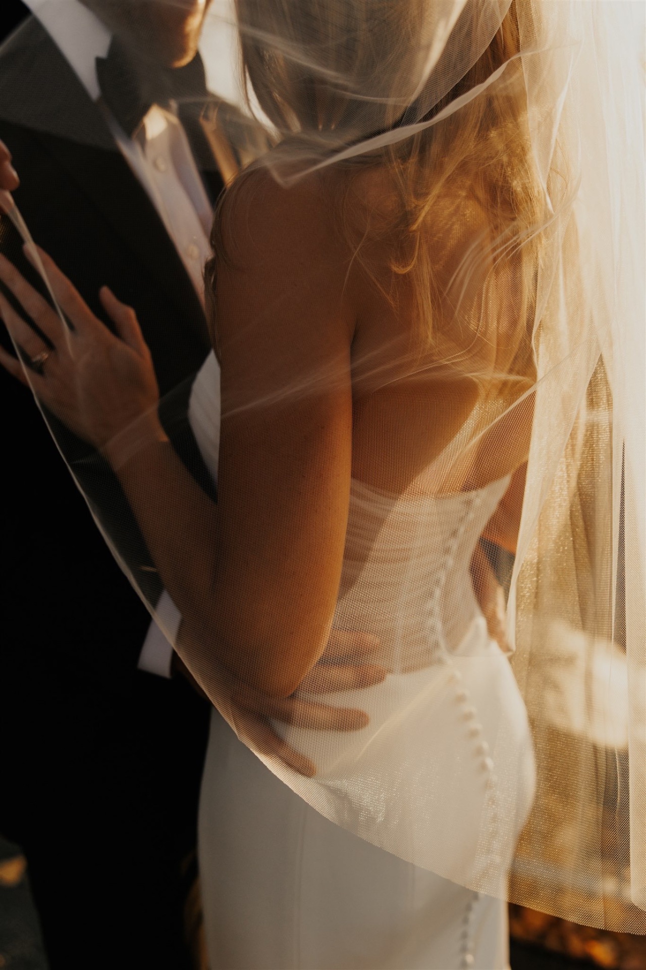 Bride and groom sharing a quiet moment at their wedding
